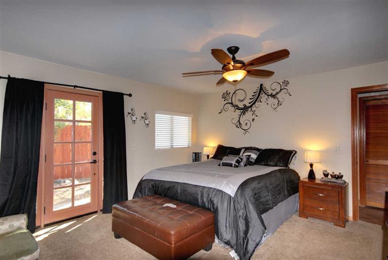 198 Riverside Road Oak View, CA 93022 - Photo 10 of 24 a bedroom with a bed and window