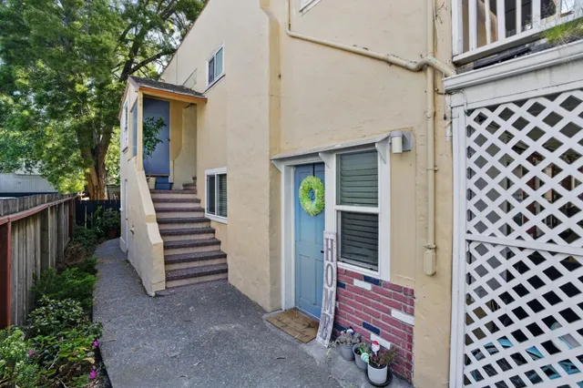 a view of a house with a street