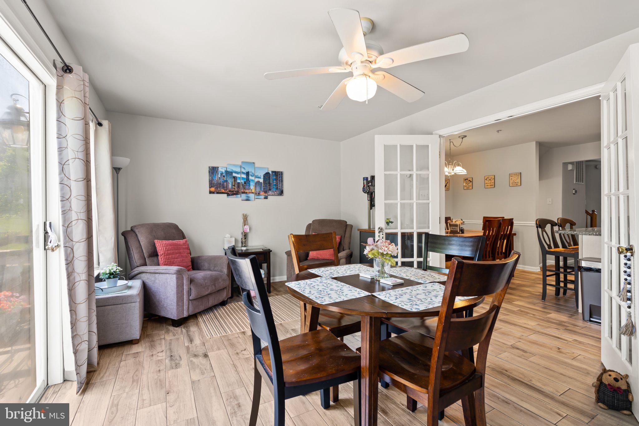 128 Sentry Ridge Smithsburg, MD 21783 - Photo 14 of 41 a view of a dining room with furniture and wooden floor