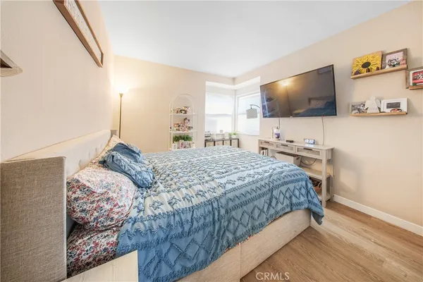 a bed room with a bed and a couch