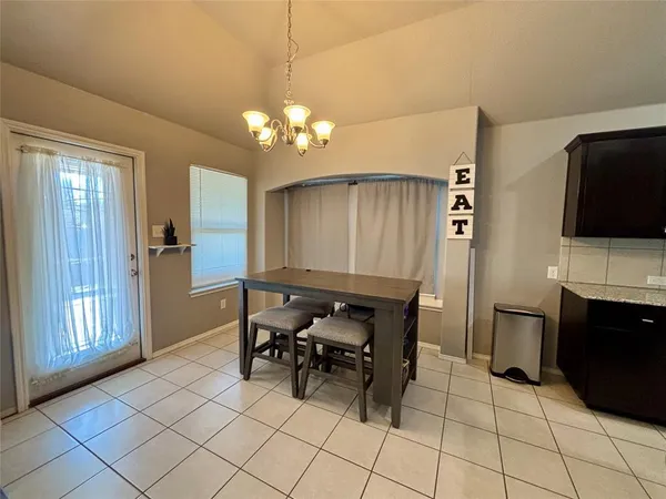 a view of a livingroom with furniture