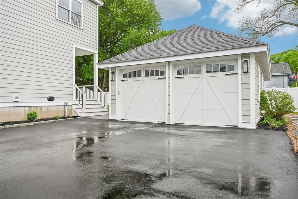 13 Parker Road Wakefield, MA 01880 - Photo 25 of 26 a house with a yard and parking space