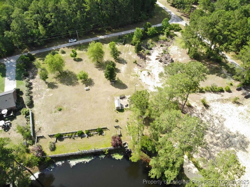 7874 Jill Street Linden, NC 28356 - Photo 5 of 5 a view of swimming pool with a yard