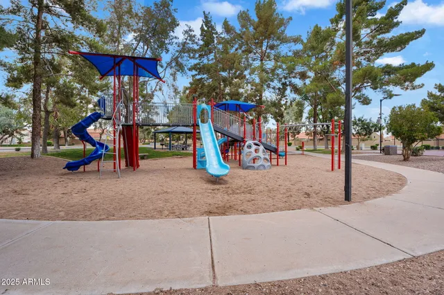 a view of a park with swings