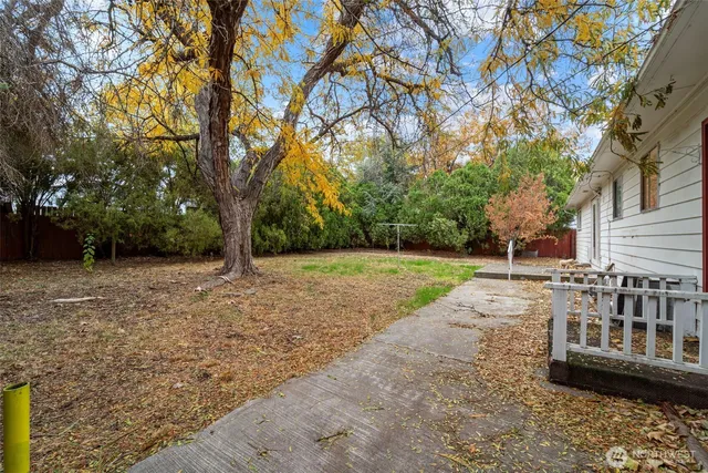 a house view with a garden space