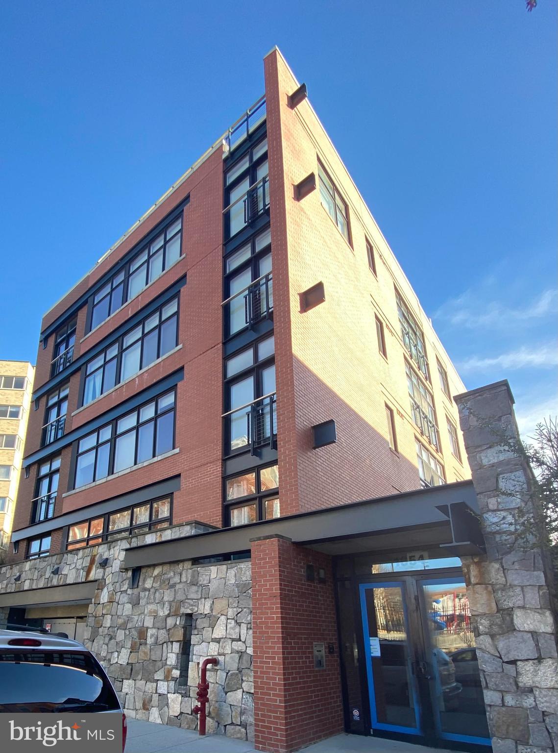 1654 Euclid Street Northwest, Unit 105 Washington, DC 20009 - Photo 2 of 29 a front view of a building