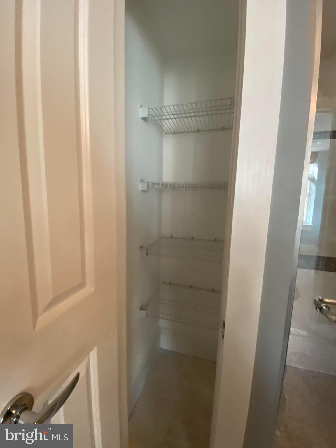1654 Euclid Street Northwest, Unit 105 Washington, DC 20009 - Photo 26 of 29 a bathroom with a glass shower door
