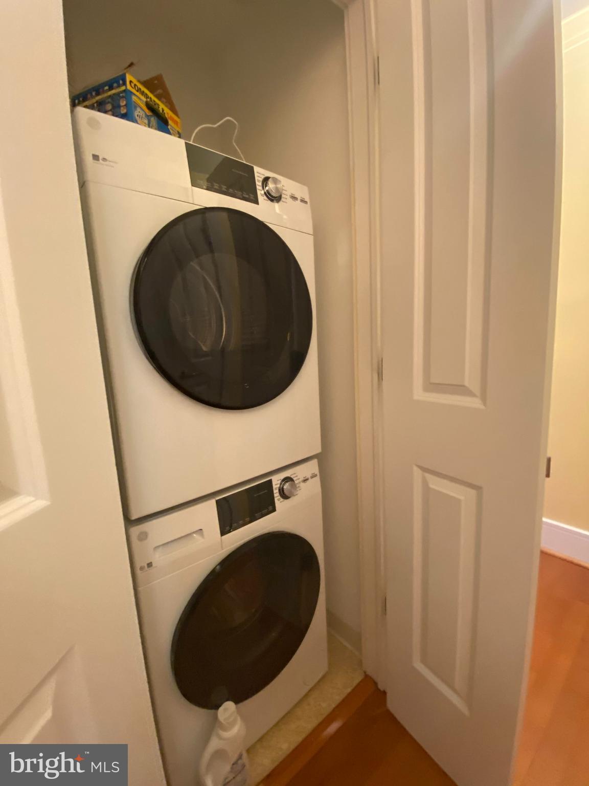 1654 Euclid Street Northwest, Unit 105 Washington, DC 20009 - Photo 27 of 29 a utility room with dryer and washer
