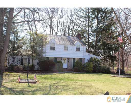 75 Stafford Road Colonia, NJ 07067 - Photo 1 of 10 a front view of a house with a yard