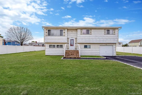 front view of house with a yard