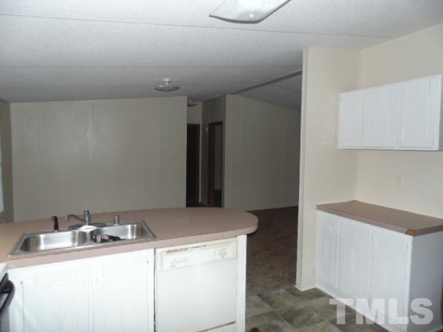 4522 Thomas Road Henderson, NC 27537 - Photo 14 of 19 a room with storage and utility