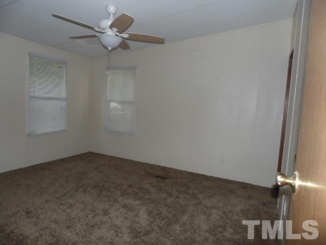 4522 Thomas Road Henderson, NC 27537 - Photo 15 of 19 wooden floor in an empty room
