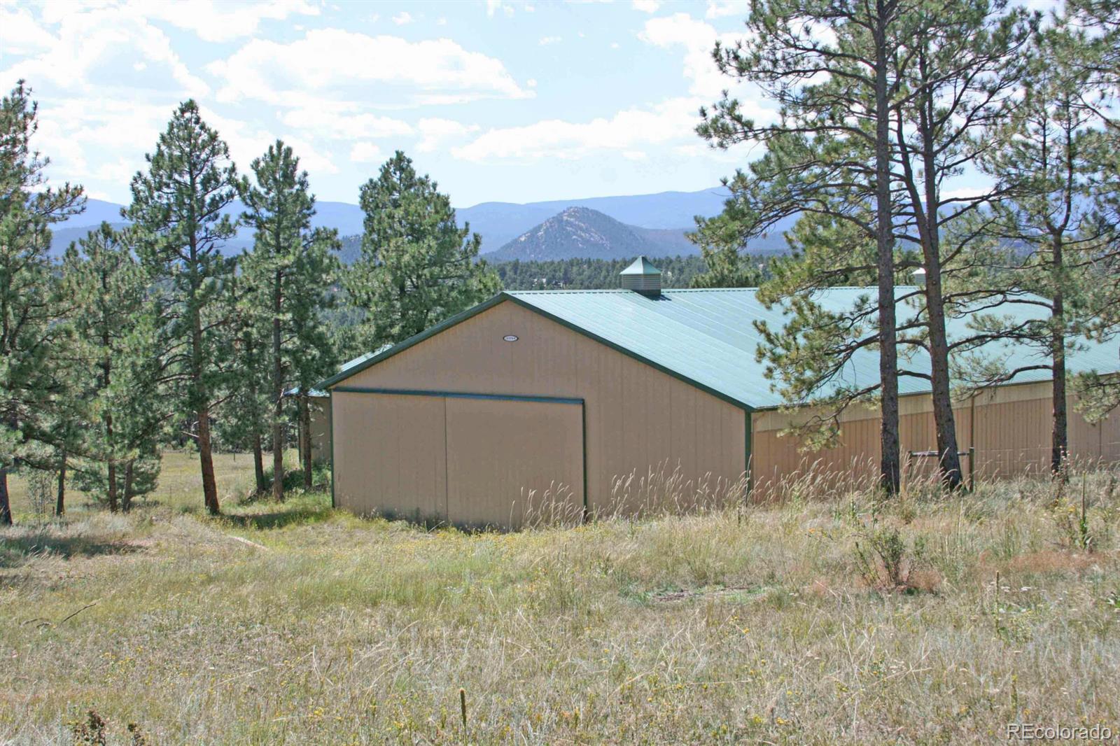 2127 Wieler Road Evergreen, CO 80439 - Photo 31 of 35 a house view with backyard space