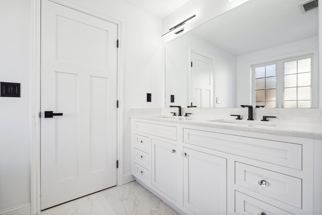 6 Coppersmith Way Townsend, MA 01469 - Photo 13 of 33 a bathroom with a double vanity sink mirror and