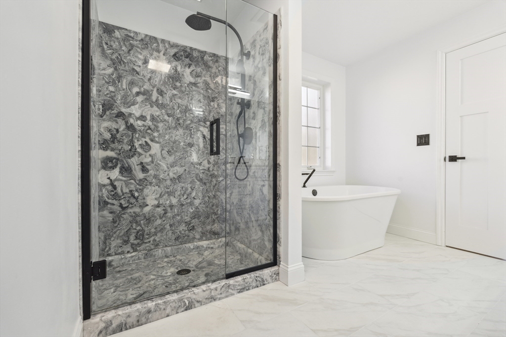 6 Coppersmith Way Townsend, MA 01469 - Photo 14 of 33 a bathroom with a shower and a bathtub