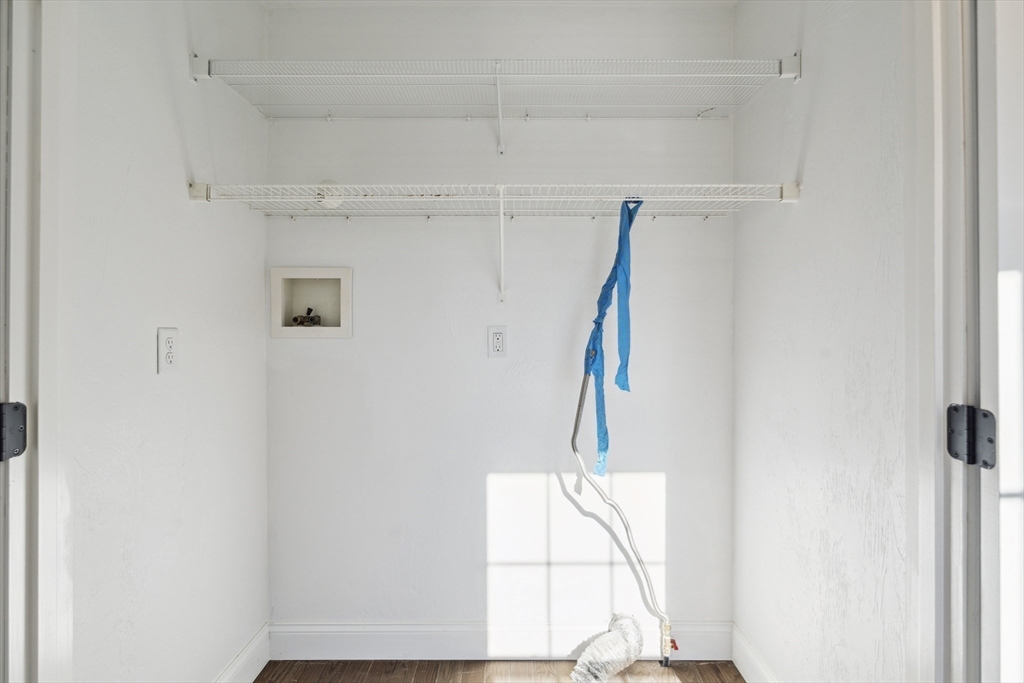 6 Coppersmith Way Townsend, MA 01469 - Photo 17 of 33 a close view of light fixtures and a window of the bathroom