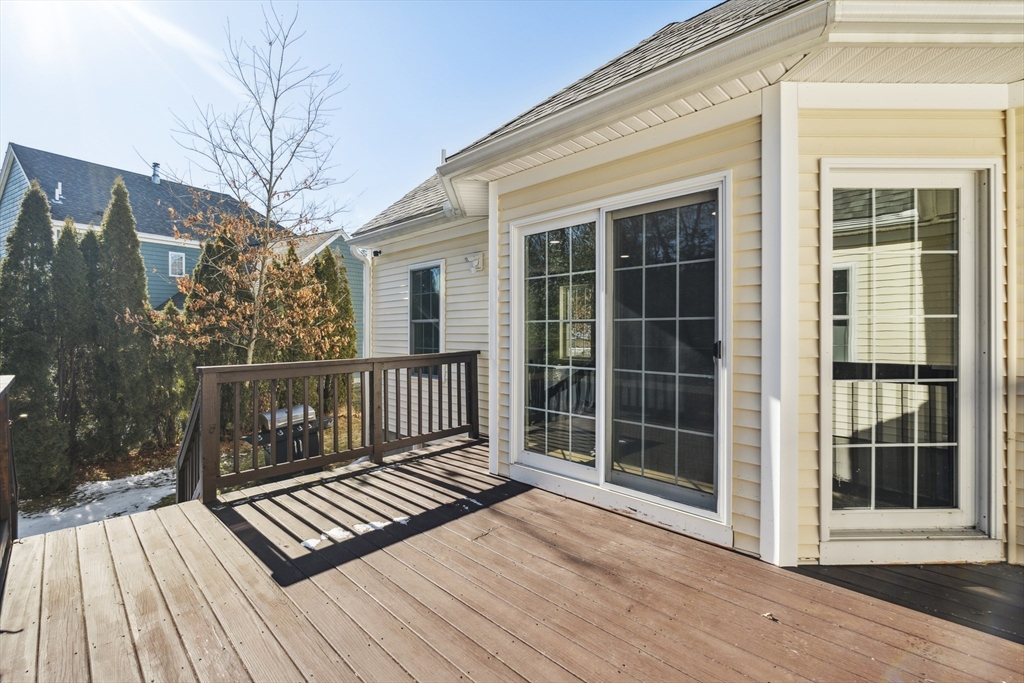6 Coppersmith Way Townsend, MA 01469 - Photo 26 of 33 a view of a deck with wooden floor and fence