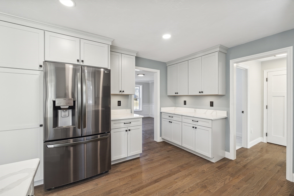 6 Coppersmith Way Townsend, MA 01469 - Photo 3 of 33 a kitchen with stainless steel appliances a refrigerator sink and cabinets