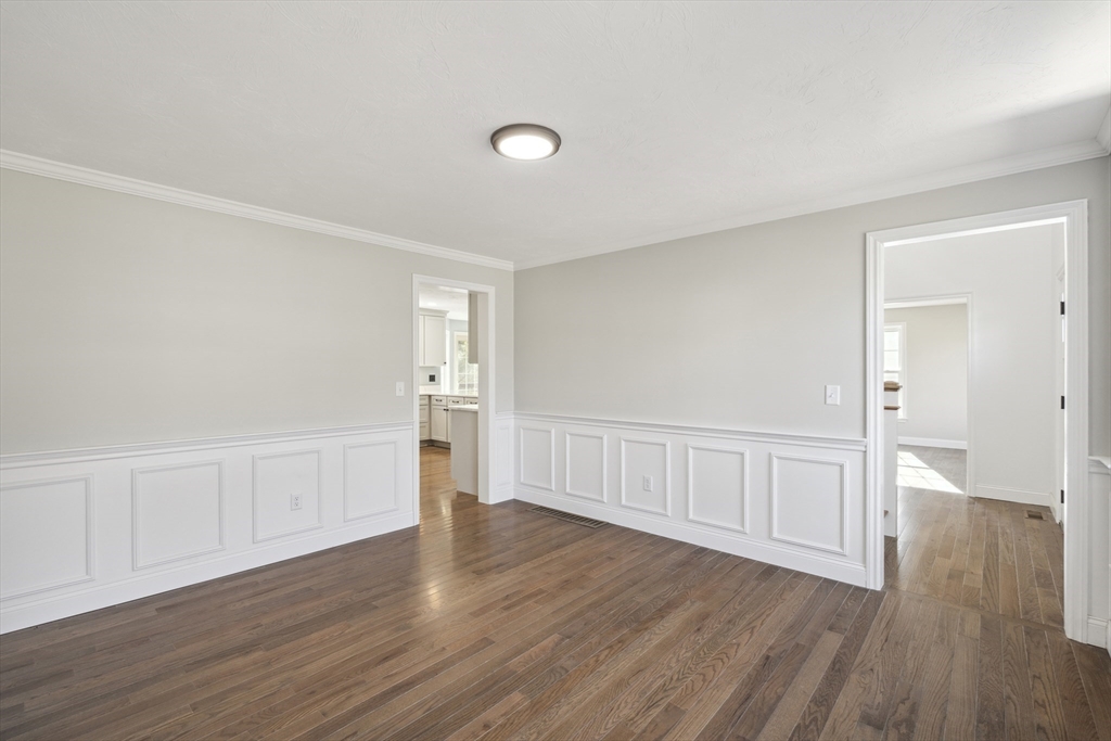 6 Coppersmith Way Townsend, MA 01469 - Photo 6 of 33 a view of an empty room with wooden floor