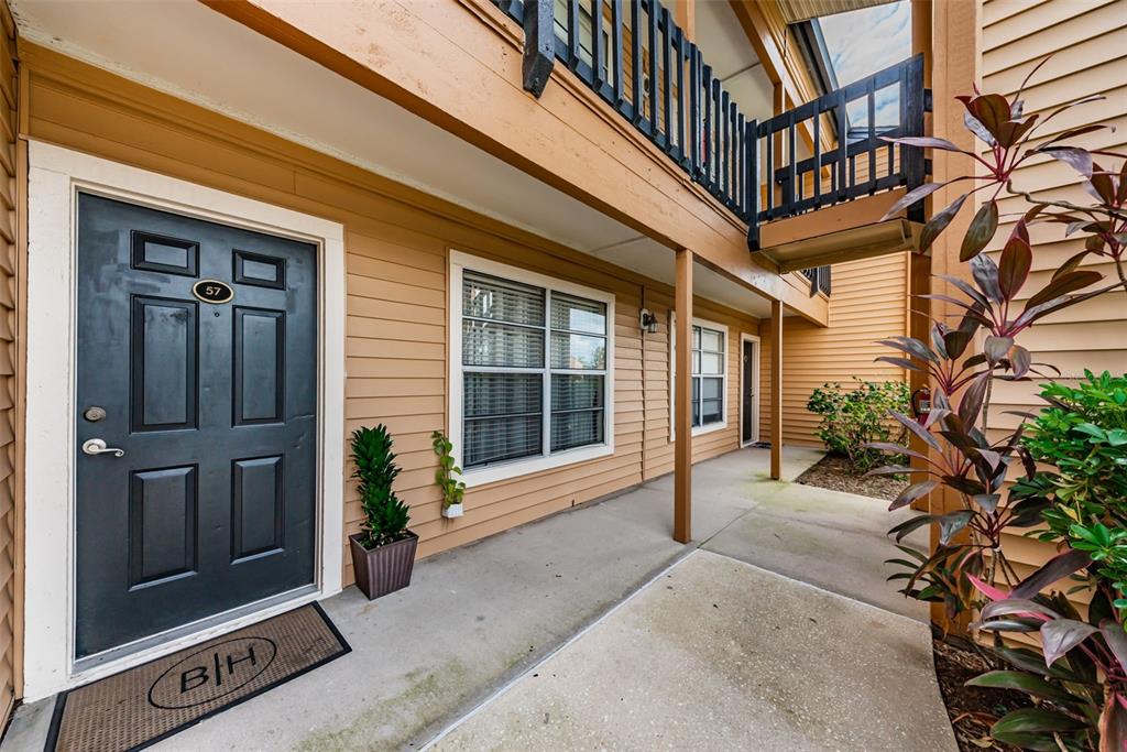 500 South Belcher Road, Unit 57 Largo, FL 33771 - Photo 1 of 1 a front view of a building with a porch