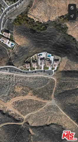 a view of car parked on the road