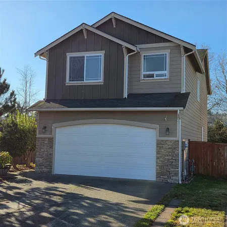 a front view of house with yard