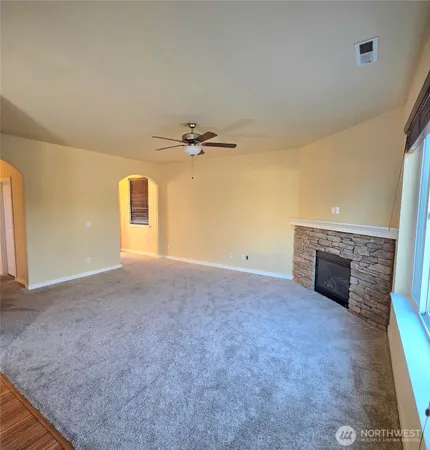 a view of a livingroom with a fireplace