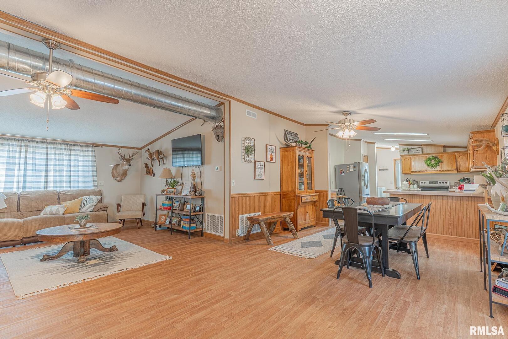 565 Dutton Chapel Road Herod, IL 62947 - Photo 34 of 54 a dining room with furniture window and wooden floor