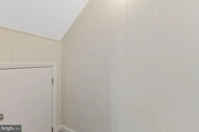 a utility room with sink dryer and washer