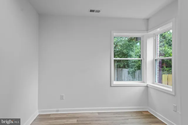 a view of a room that has a window in it