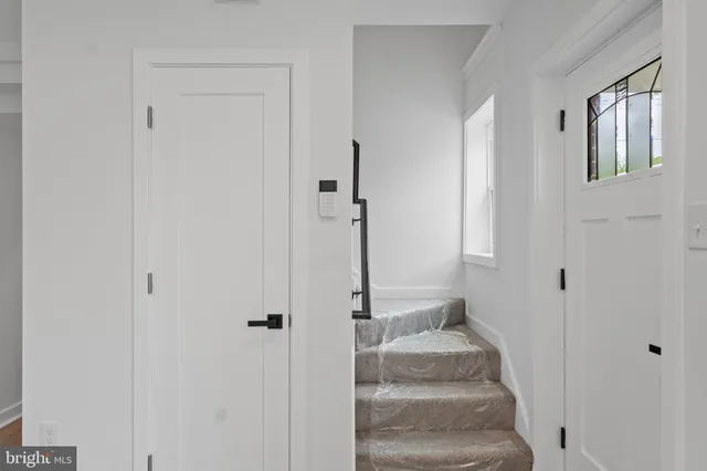 a view of an entryway with staircase