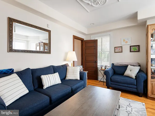 a living room with furniture and a couch