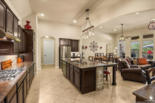 a kitchen with granite countertop lots of counter top space