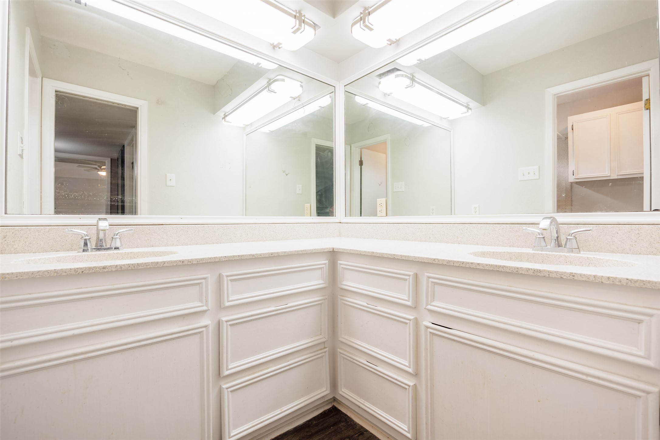 320 Long Point Drive Portland, TX 78374 - Photo 13 of 40 The upstairs bathroom provides a massive wraparound vanity with dual sinks, ensuring plenty of personal space and storage for the secondary bedrooms.