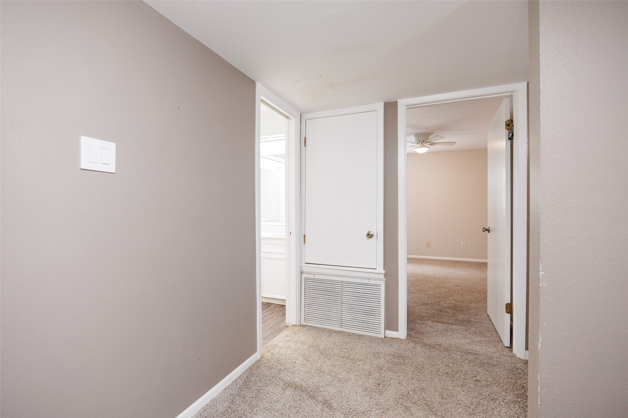 320 Long Point Drive Portland, TX 78374 - Photo 15 of 40 Neutral tone wall paint with white trim, complementing the light beige carpet