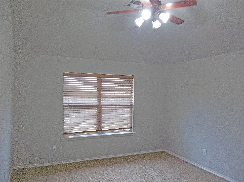 110 Fossil Trail Leander, TX 78641 - Photo 8 of 12 an empty room with a window