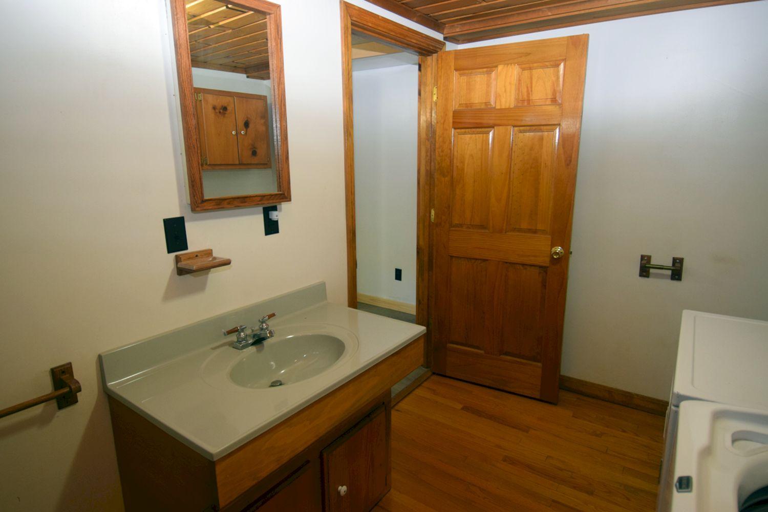 110 Patterson Bridge Road North Anson, ME 04958 - Photo 27 of 94 first floor laundry with bath 1