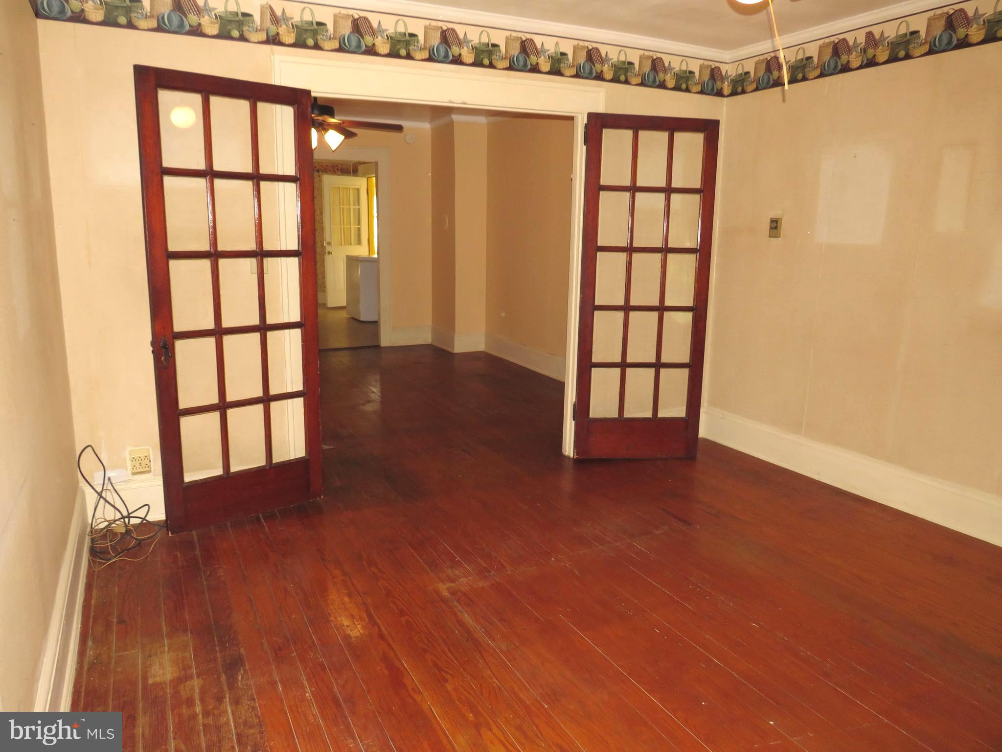 9857 Deal Island Road Deal Island, MD 21821 - Photo 11 of 41 French doors between LR/DR