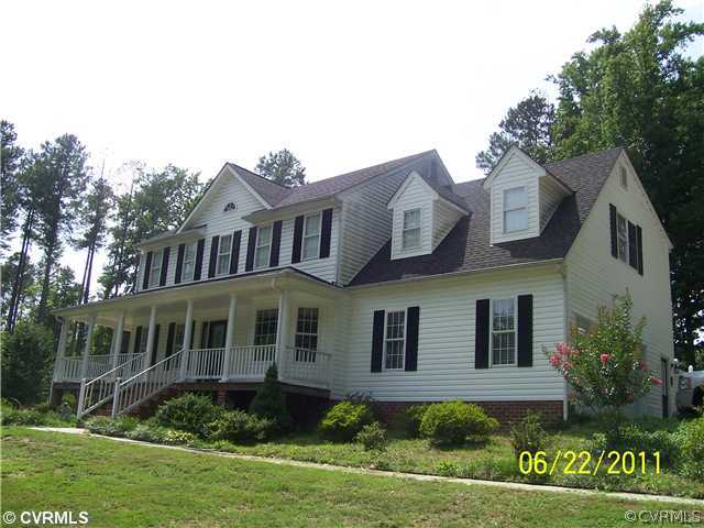 3307 Whitehouse Road Colonial Heights, VA 23834 - Photo 1 of 12 a front view of a house with a yard