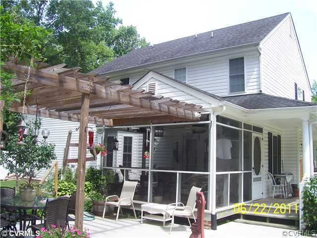 3307 Whitehouse Road Colonial Heights, VA 23834 - Photo 12 of 12 a view of a house with a window and wooden fence