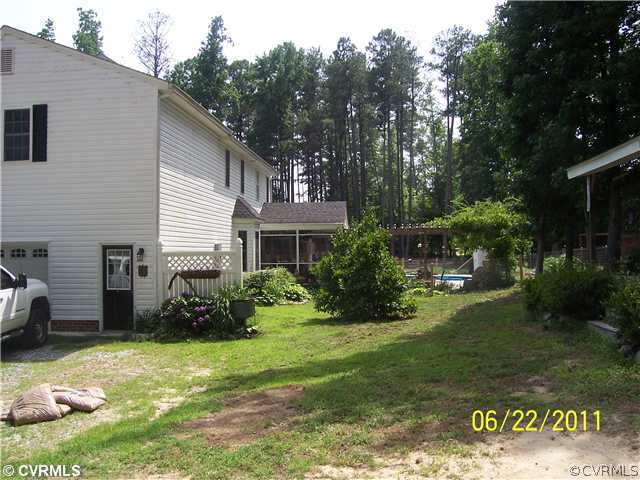 3307 Whitehouse Road Colonial Heights, VA 23834 - Photo 2 of 12 a front view of a house with garden