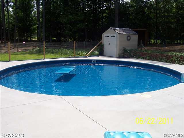 3307 Whitehouse Road Colonial Heights, VA 23834 - Photo 3 of 12 a view of swimming pool with a yard