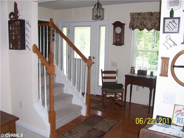 3307 Whitehouse Road Colonial Heights, VA 23834 - Photo 9 of 12 a view of a hallway with furniture and staircase