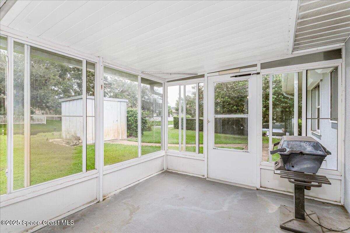 948 Pelican Lane Rockledge, FL 32955 - Photo 18 of 38 a view of a room with a large window