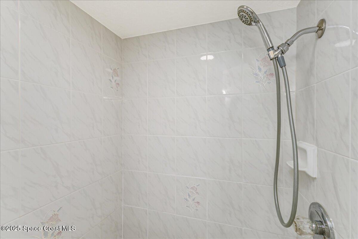 948 Pelican Lane Rockledge, FL 32955 - Photo 23 of 38 a bathroom with a shower