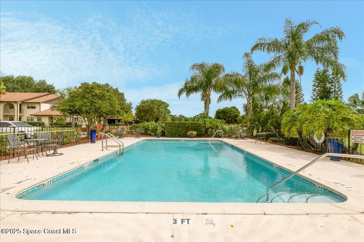 948 Pelican Lane Rockledge, FL 32955 - Photo 32 of 38 a view of swimming pool