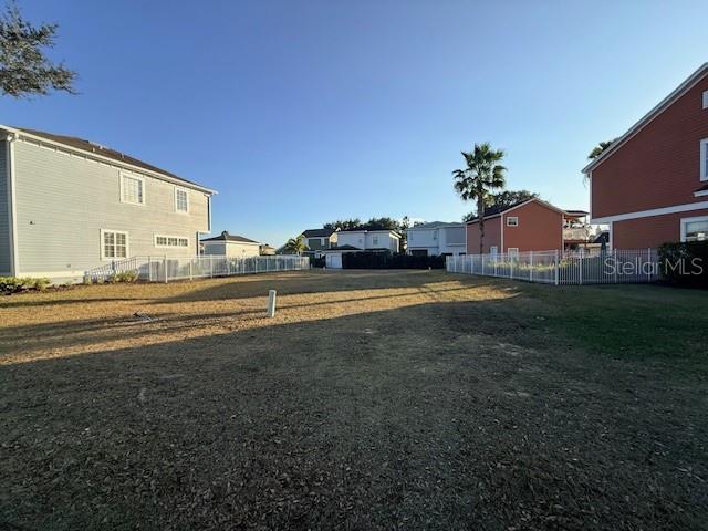 7482 Gathering Drive Reunion, FL 34747 - Photo 3 of 20 a view of street with houses
