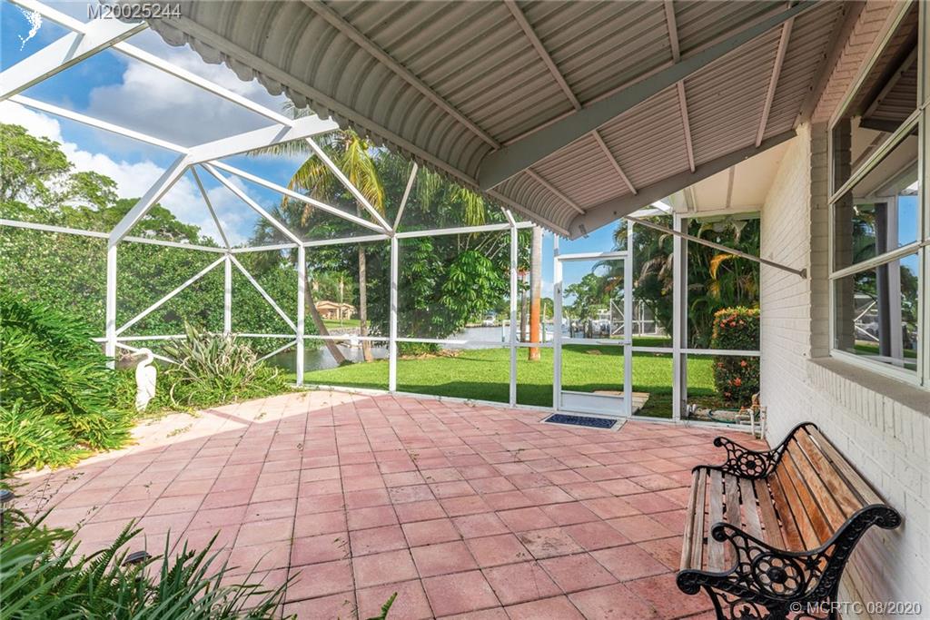 1194 Northwest Spruce Ridge Drive Stuart, FL 34994 - Photo 25 of 34 a view of backyard with green space