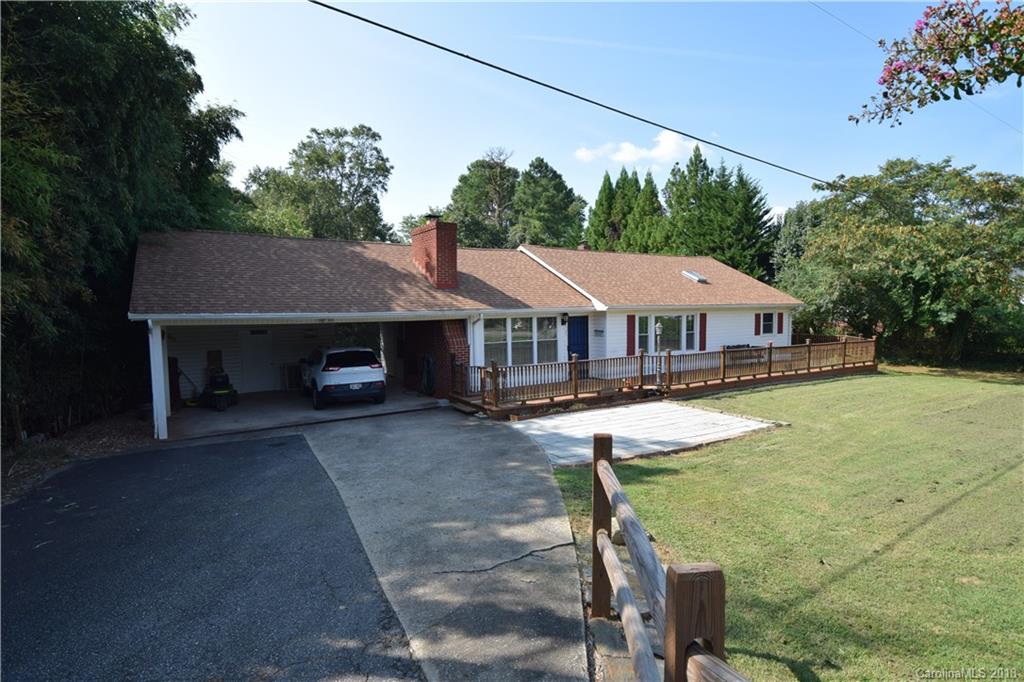 121 Thompson Road Rutherfordton, NC 28139 - Photo 22 of 29 a house with swimming pool in front of it