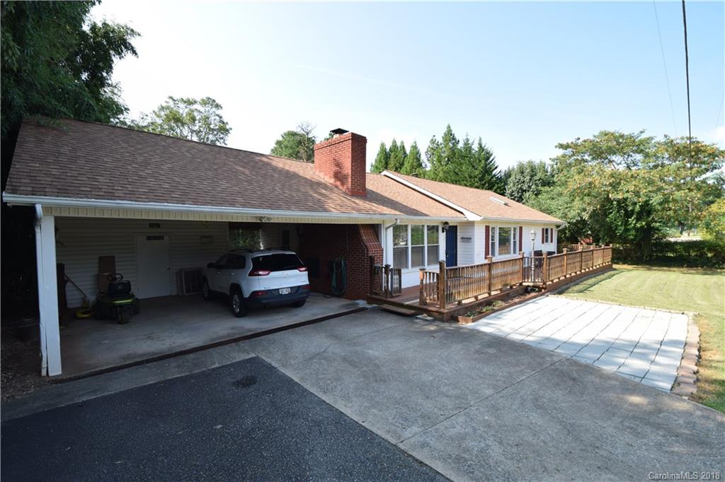 121 Thompson Road Rutherfordton, NC 28139 - Photo 23 of 29 a front view of a house with a garden